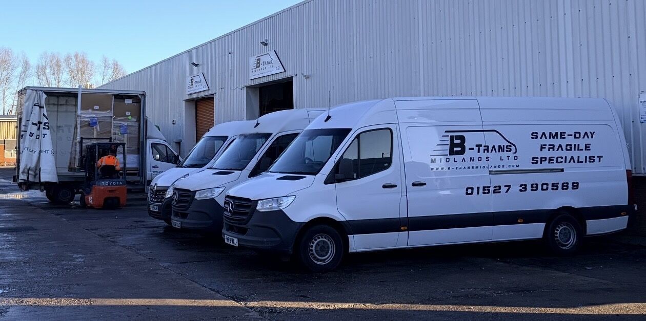 B-Trans vans lined up at the depot